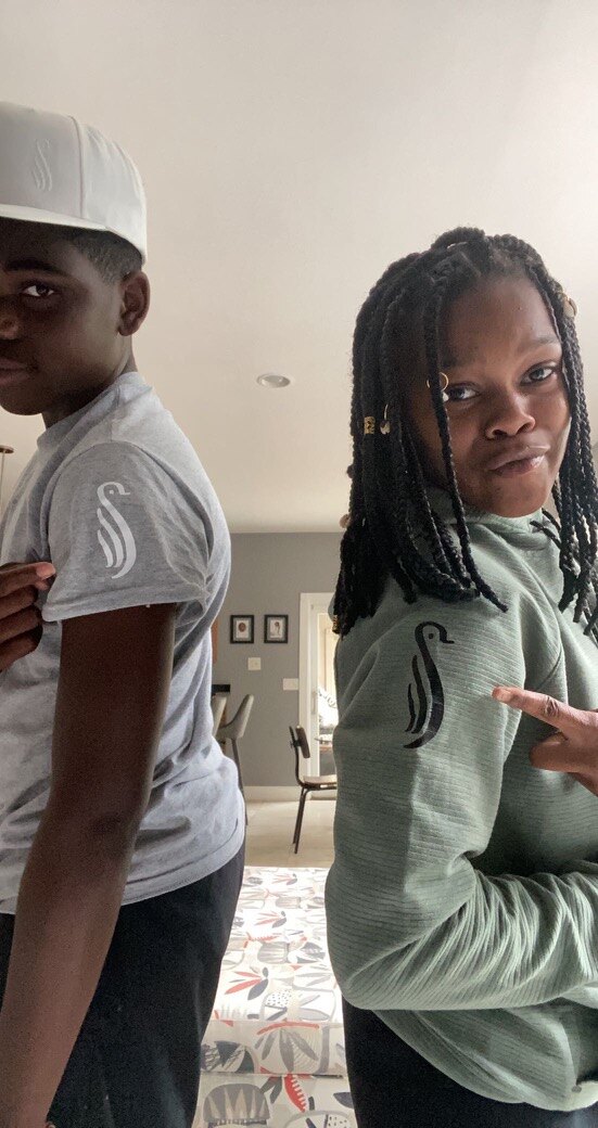 Young family members wearing Gentoo shirts at the 2022 event
