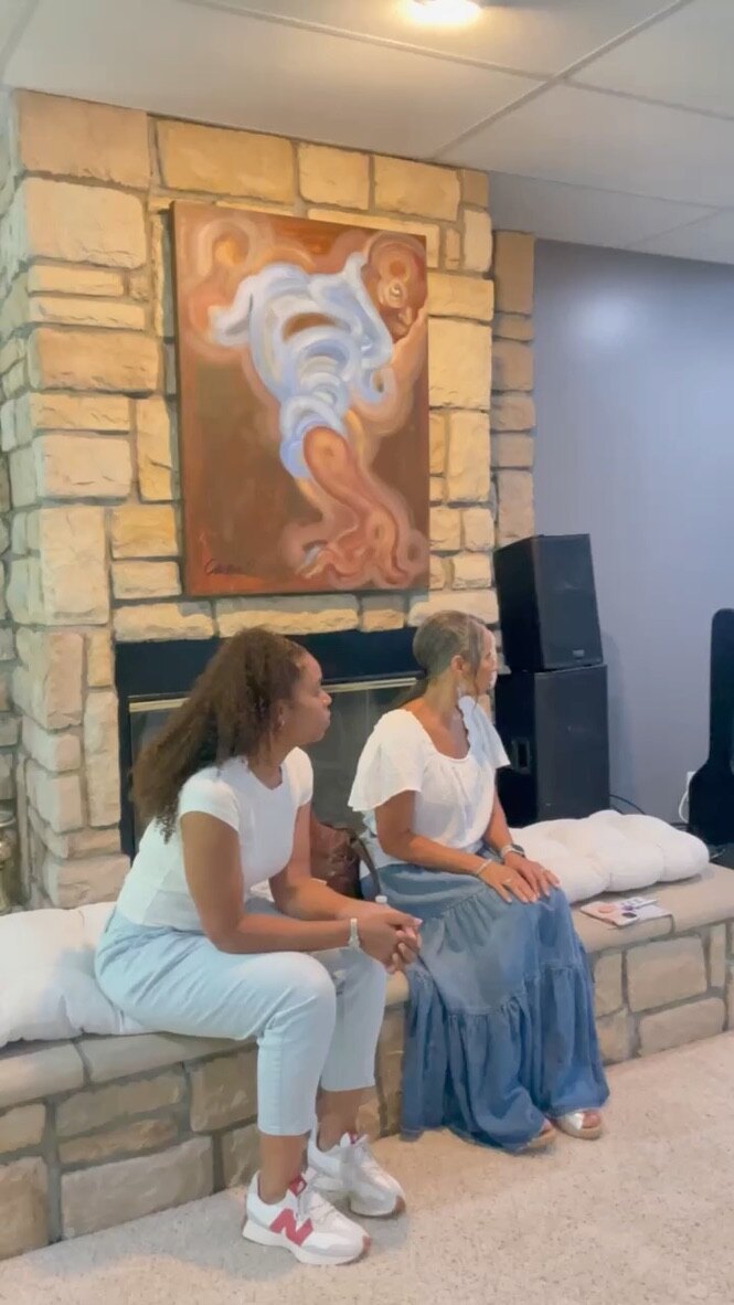 Family members in conversation at the 2023 gathering